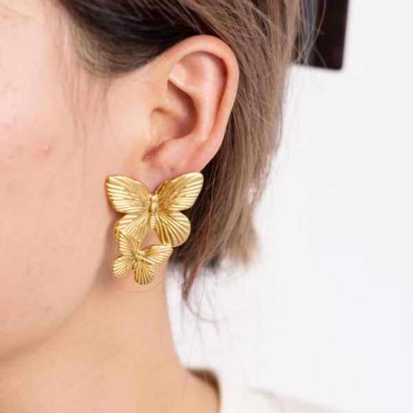 Boucle d’oreille en forme de papillon